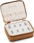 Our pill case features a convenient internal pocket sleeve to discreetly store and access birth control, pack-pills, or healthcare cards. Keep everything you need in one compact and organized place.